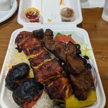 Chortke - Platter #3. Half rice and half salad, spicy chicken and steak. - Persian/Iranian Near Me - Rochester, New York Chortke - Platter #3. Half rice and half salad, spicy chicken and steak. - Persian/Iranian Near Me - Rochester, New York