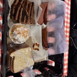 Rudy's "Country Store" and Bar-B-Q - Brisket, sausage, nana puddin', and bread for soppin'.