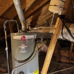 A.U. Plumbing - Gas tank style water heater installation