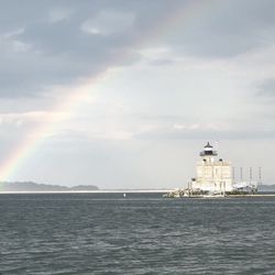 Huntington Lighthouse Preservation Society - Huntington Lighthouse during summer rain shower. Rainbow on left!