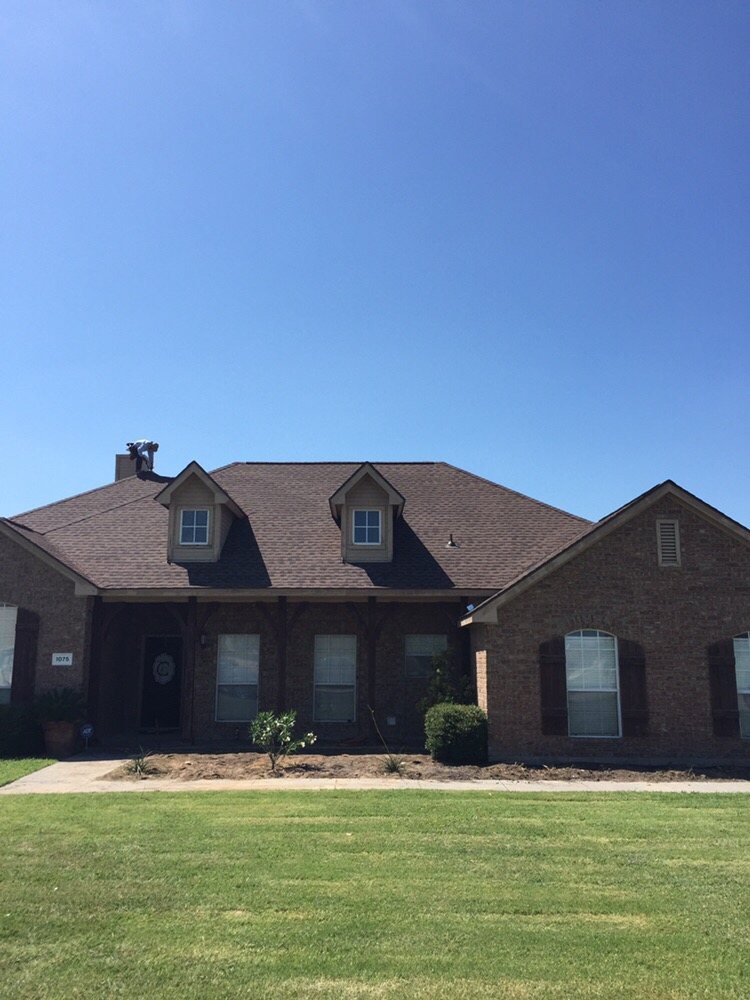 Slide of Tiger Roofing