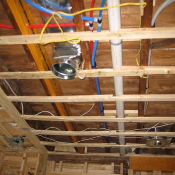 Frank M. Prall Electric - a view of the electrical wiring in the ceiling - Electricians Near Me - Wellesley, Massachusetts Frank M. Prall Electric - a view of the electrical wiring in the ceiling - Electricians Near Me - Wellesley, Massachusetts