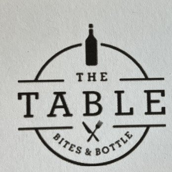 The Table - a bottle of wine and a knife - Coffee & Tea Near Me - Grove, Oklahoma The Table - a bottle of wine and a knife - Coffee & Tea Near Me - Grove, Oklahoma