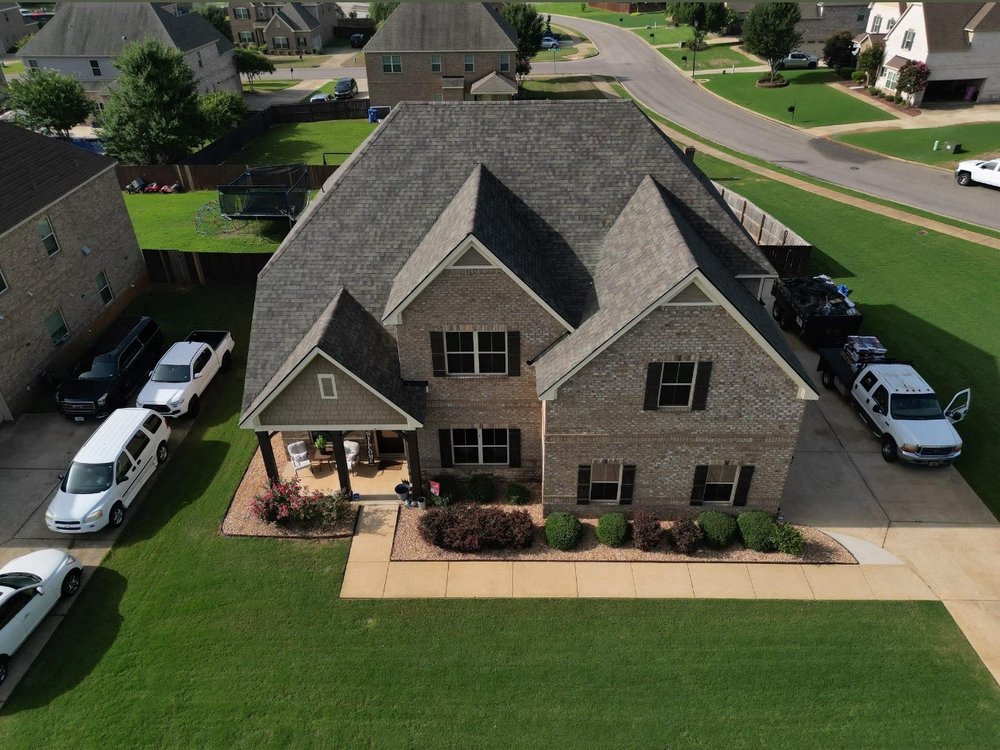 Slide of All Slopes Roofing