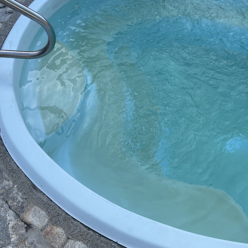 Ace Pool and Spa - Picture of step after tech cleaned the second time after returning. - Pool & Hot Tub Service Near Me
