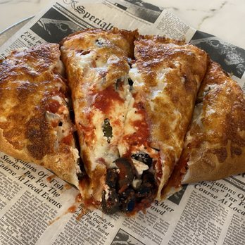 Mig's Pizza Castle - Garden Calzone - Pizza Near Me - Greenwood, South Carolina Mig's Pizza Castle - Garden Calzone - Pizza Near Me - Greenwood, South Carolina
