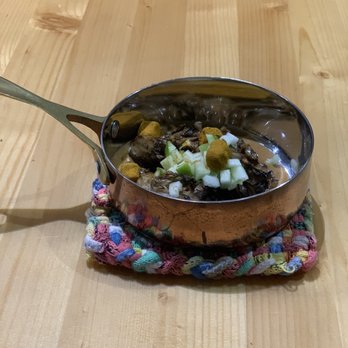 Nook - Wild rice porridge with maitake mushrooms, apples, and butter rolled in curry powder - New American Near Me - Madison, Wisconsin