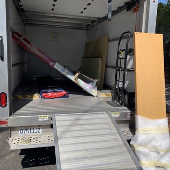 Alphabet Construction and Remodeling - Cabinet pieces being loaded into truck. - General Contractors Near Me Alphabet Construction and Remodeling - Cabinet pieces being loaded into truck. - General Contractors Near Me