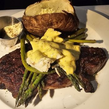 Epic Chophouse - Ribeye 104 South (Oscar style) with asparagus and baked potato - Seafood Near Me - Greensboro, North Carolina Epic Chophouse - Ribeye 104 South (Oscar style) with asparagus and baked potato - Seafood Near Me - Greensboro, North Carolina