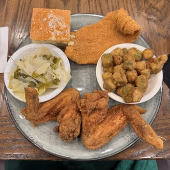 Kountry Kitchen - Combo meal: fried chicken wings and catfish with fried okra and cabbage. - Soul Food Near Me - Indianapolis, Indiana