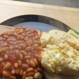 Beans and scrambled eggs on toast