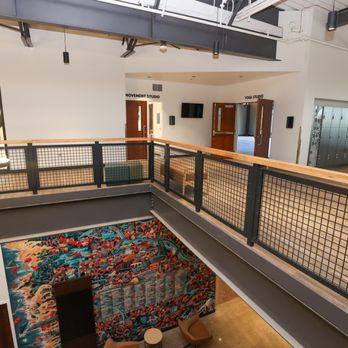 Eugene Family YMCA - The second floor houses the Yoga Studio and the Movement Studio and has a great view of the donor wall! - Child Care & Day Care Near Me - Eugene, Oregon