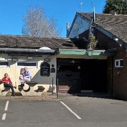 The Wansbeck - Exterior with Sam the landlady and her husband