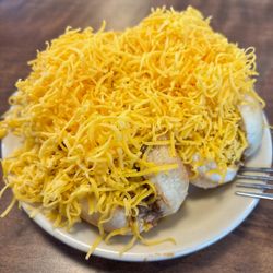 Skyline Chili - Two delicious Skyline dogs, smothered in chili and cheese. . .SO MUCH CHEESE