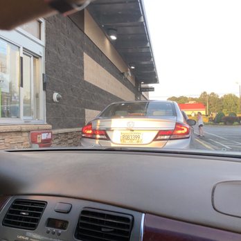 McDonald's - a car driving down the street - Fast Food Near Me - Adairsville, Georgia McDonald's - a car driving down the street - Fast Food Near Me - Adairsville, Georgia