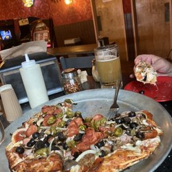 Gino's Pizza Inn - Yumminess on a pizza platter X2