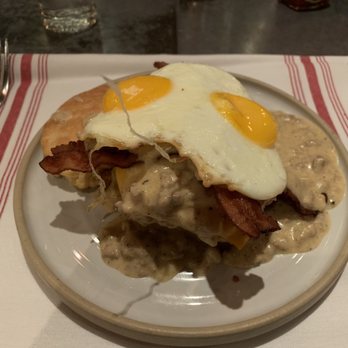 Yardbird - Boneless fried chicken, bacon, biscuits & gravy, with two sunny side up eggs - Southern Near Me - Las Vegas, Nevada Yardbird - Boneless fried chicken, bacon, biscuits & gravy, with two sunny side up eggs - Southern Near Me - Las Vegas, Nevada