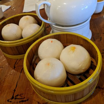 Koi Palace - Egg yolk lava bun! Gooey, sweet custard in the middle. - Dim Sum Near Me - Milpitas, California Koi Palace - Egg yolk lava bun! Gooey, sweet custard in the middle. - Dim Sum Near Me - Milpitas, California