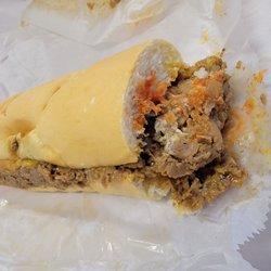 Antonio's Deli - Half a cheesesteak with ketchup, mayo, and fried onions
