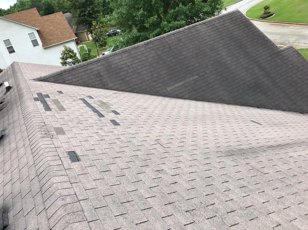 Slide of ER Roofing Specialist