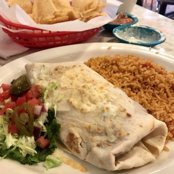 Chuy's - Fajita Beef Burrito with side of Creamy Jalapeño - Tex-Mex Near Me - Lutz, Florida Chuy's - Fajita Beef Burrito with side of Creamy Jalapeño - Tex-Mex Near Me - Lutz, Florida
