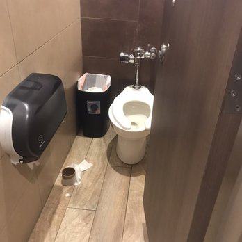 Cunningham Bill Exxon - a toilet and trash can - Convenience Stores Near Me - New Boston, Texas