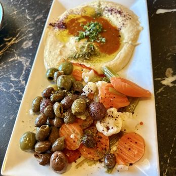 Sultan Mediterranean Grill - Two appetizer plate - olives and pickles & spicy hummus - Mediterranean Near Me - Moab, Utah Sultan Mediterranean Grill - Two appetizer plate - olives and pickles & spicy hummus - Mediterranean Near Me - Moab, Utah