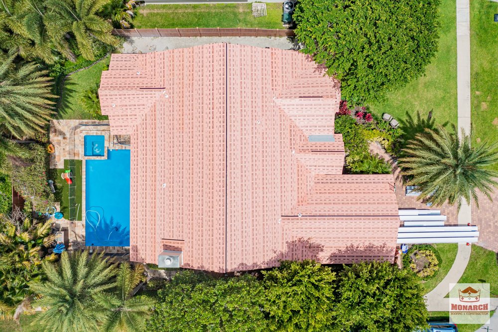 Slide of Monarch Roofing & Construction Inc.