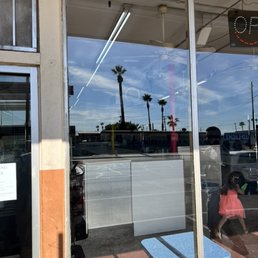 Exterior outside entrance of Golden Arrow Glass - Commercial laminated glass install Exterior outside entrance of Golden Arrow Glass - Commercial laminated glass install