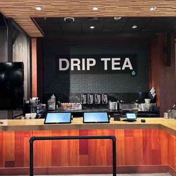 Drip Tea - a counter with laptops on it - Bubble Tea Near Me - Bellevue, Washington