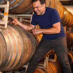 Portland Wine Company - The wine maker Matt getting a taste from the barrel for guests