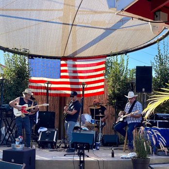 The Old Corner Saloon - a band playing on stage - Bars Near Me - Clements, California