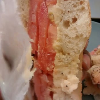 Penny House Cafe - Soo good! Smoked salmon, hummus, red onion and tomato on everything bagel. Great alternative to cream cheese. - Coffee & Tea Near Me - Brooklyn, New York