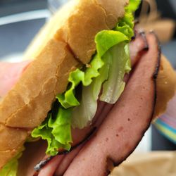 The Tulsa (smoked shaved baloney, mayo, lettuce, tomato)