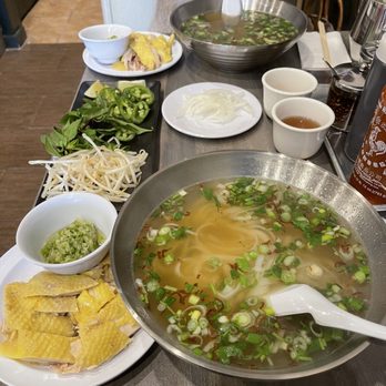 Saigon 88 - My husband, Franklin across from me as you can see, LOVED his PHO GA. I loved the ginger scallion sauce, and broth. - Vietnamese Near Me - Sacramento, California