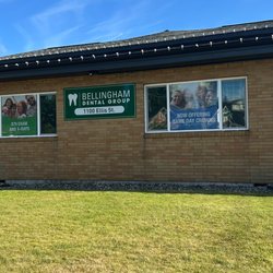 Bellingham Dental Group - Front view of Bellingham Dental Group at 1100 Ellis Street. Window signs highlight current offers like seventy nine dollar ex...