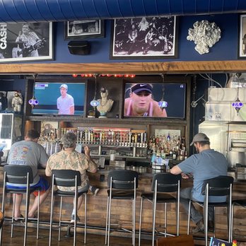 Twilight Tavern - people sitting at the bar watching televisions - Sports Bars Near Me - Nashville, Tennessee Twilight Tavern - people sitting at the bar watching televisions - Sports Bars Near Me - Nashville, Tennessee
