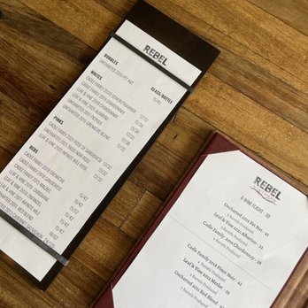 Rebel Vintners - a menu and a wine glass - Wine Tasting Room Near Me - Napa, California Rebel Vintners - a menu and a wine glass - Wine Tasting Room Near Me - Napa, California