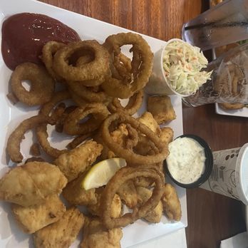 Tides Restaurant & Pub - Fried haddock, with onion rings (the best) and coleslaw. - Seafood Near Me - Nahant, Massachusetts Tides Restaurant & Pub - Fried haddock, with onion rings (the best) and coleslaw. - Seafood Near Me - Nahant, Massachusetts
