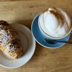 Frontside Coffee Roasters - A mountain of foam and chocolate croissant.