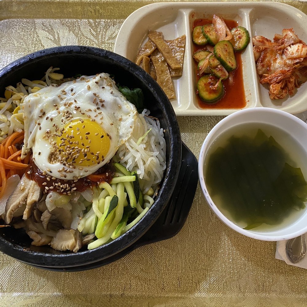 Gamja Bawi - Dolsot Bibimbap with Seaweed Soup and banchan (side dishes). - Korean Near Me - Los Angeles, California Gamja Bawi - Dolsot Bibimbap with Seaweed Soup and banchan (side dishes). - Korean Near Me - Los Angeles, California
