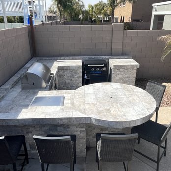 Tranquil Oasis Landscapes - an outdoor kitchen - Landscaping Near Me