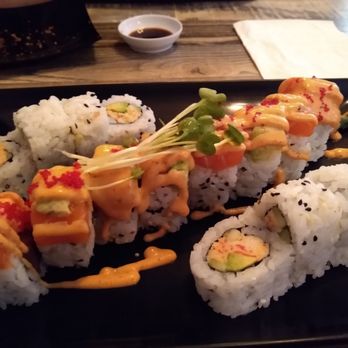 Wasabi - Spicy tuna roll on the outside. Daily special of "Atlantic Roll" on the inside. - Sushi Bars Near Me - Fargo, North Dakota Wasabi - Spicy tuna roll on the outside. Daily special of "Atlantic Roll" on the inside. - Sushi Bars Near Me - Fargo, North Dakota