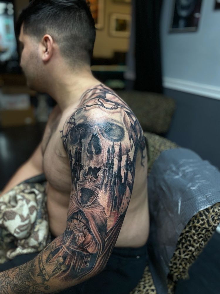 Karma Theory Tattoo And Gallery Logo