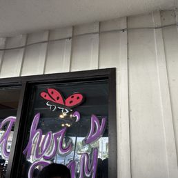Exterior outside entrance of Stacks On Route 66 - Ladybug or butterfly? - Glendora, California Exterior outside entrance of Stacks On Route 66 - Ladybug or butterfly? - Glendora, California