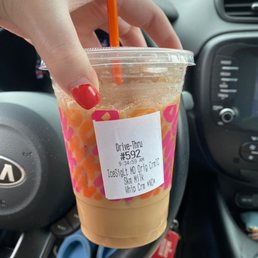 small latte with a medium sticker