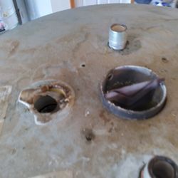 North Sound Water Heater - Top of 18yr old water heater, the pressure valve mount had melted!