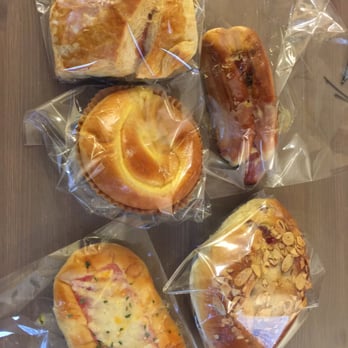 Sunmerry Bakery - my bounty of buns.  savory - hot dog bun & sweet corn/ham sweet - pudding bun, almond cranberry, forget the 3rd :x - Bakeries Near Me - Irvine, California
