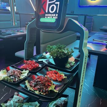KPOT Korean BBQ & Hot Pot - Robot server - Hot Pot Near Me - Pearl, Mississippi KPOT Korean BBQ & Hot Pot - Robot server - Hot Pot Near Me - Pearl, Mississippi