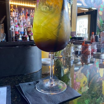 7th + Grove - Ari Lenox - Peach schnapps +blue curacao + grenadine layered with Moscato, pineapple juice + melon liqueur - Southern Near Me - Tampa, Florida